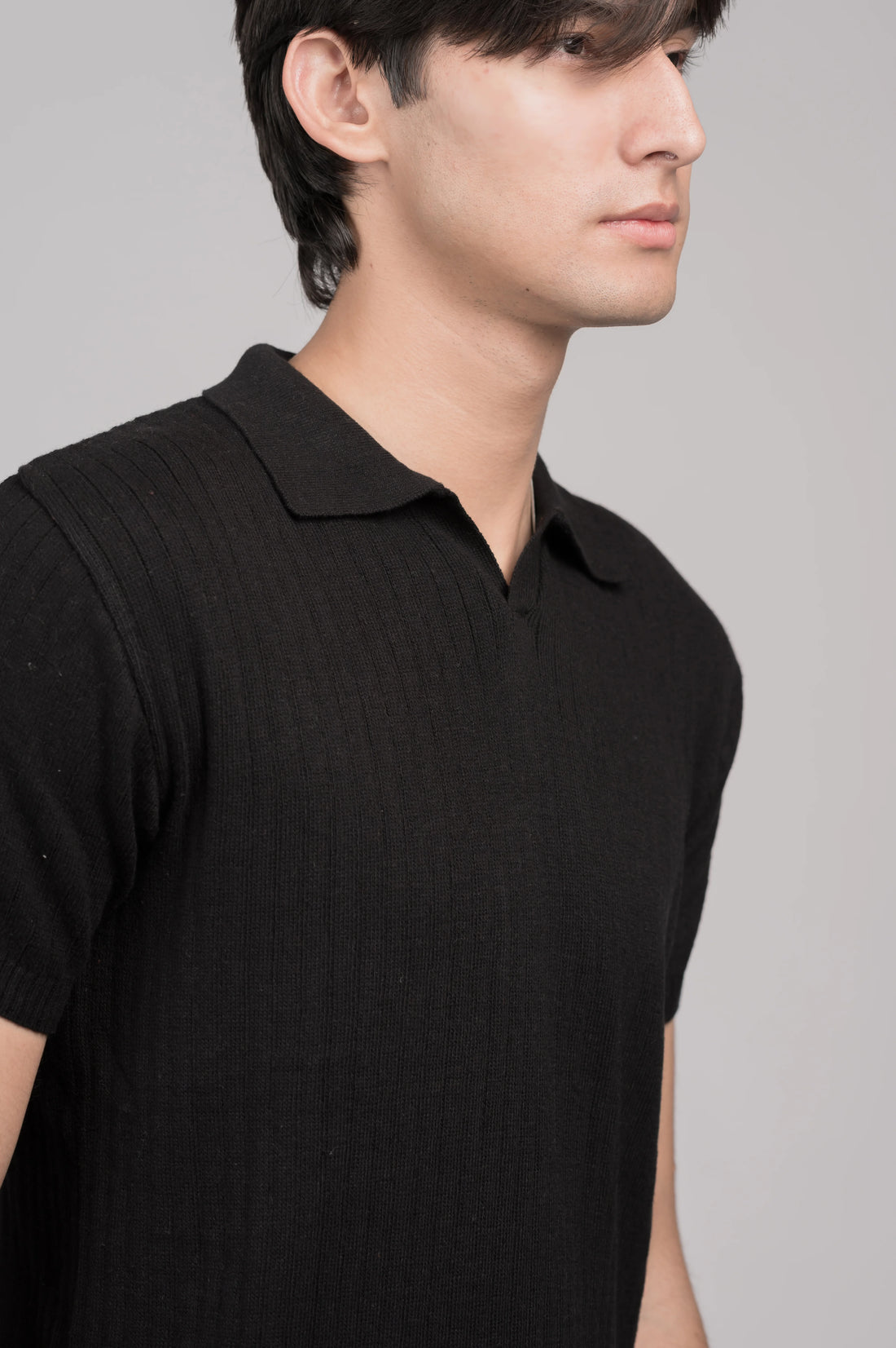 The Black Knit Polo